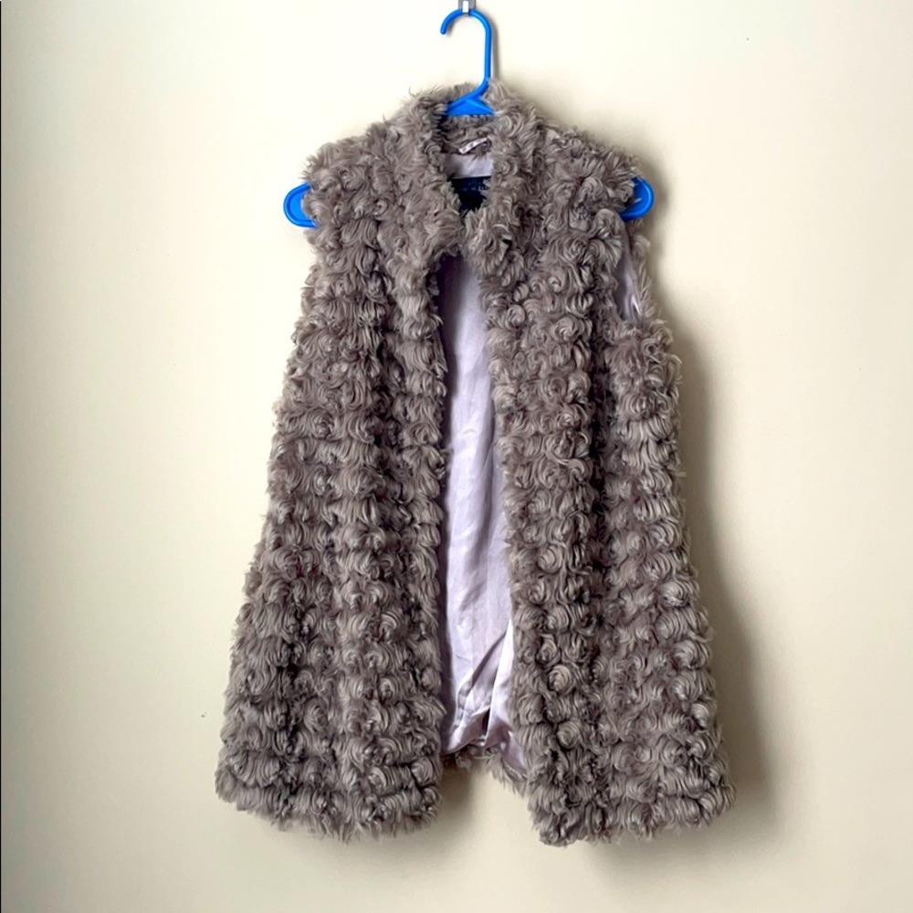 Beautiful vest/jacket. Like new.